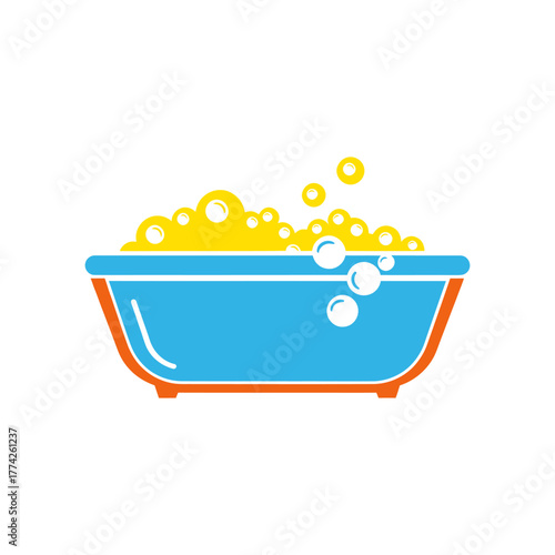 Blue bathtub filled with yellow bubbles sits ready for a relaxing bath in a bright bathroom, creating a sense of cleanliness and comfort.