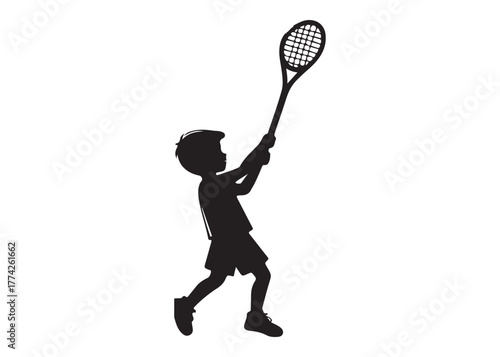 Silhouette of a little boy playing tennis