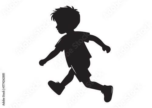 Silhouette of a young boy running