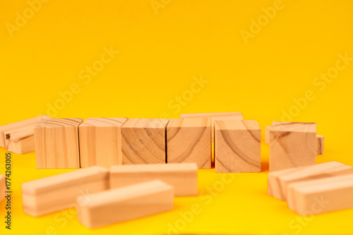 Ταπετσαρία Wooden cubes forming a barrier line to illustrate blockage, resistance, and the need to overcome obstacles