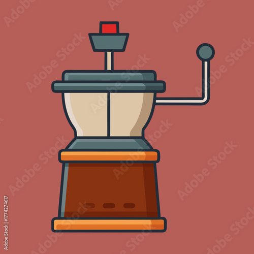 Vintage manual coffee grinder with crank handle and red top accent