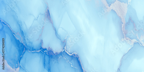 Abstract blue marble background with gentle veins, fluid texture and mineral elegance ideal for branding, posters, wallpapers.