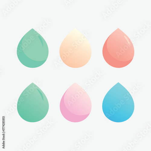 Six gradient colored makeup sponges on light gray background Keywords: makeup sponge, beauty