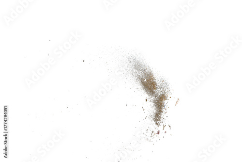 Fotografie Sand dust particles explosion isolated on white or transparent background