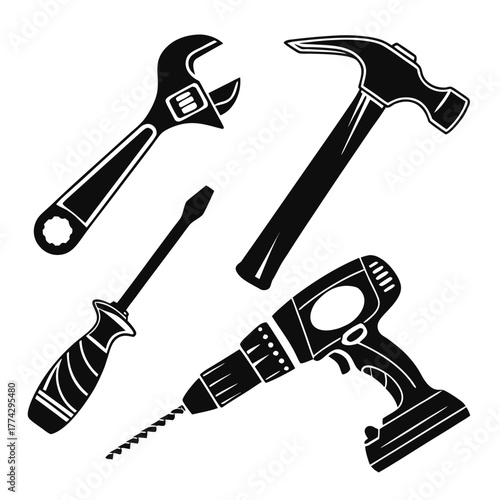 Black silhouette of tools including hammer drill wrench and screwdriver