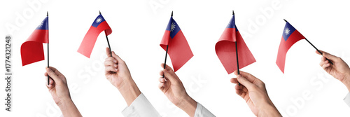 The Taiwan flag in hand in different angles on a white background