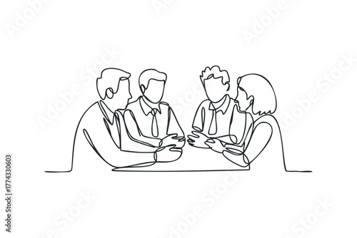 Team collaborate at a meeting table