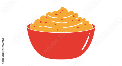 A vibrant red bowl filled with a textured orange swirl of dessert