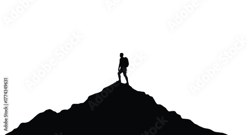 Silhouette of a person standing atop a mountain peak isolated view