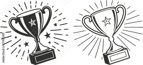 Two trophy designs, set against a stark white background, are displayed. The first, on the left, presents a solid black trophy, radiating outward lines suggesting movement and stars. The trophy is a c