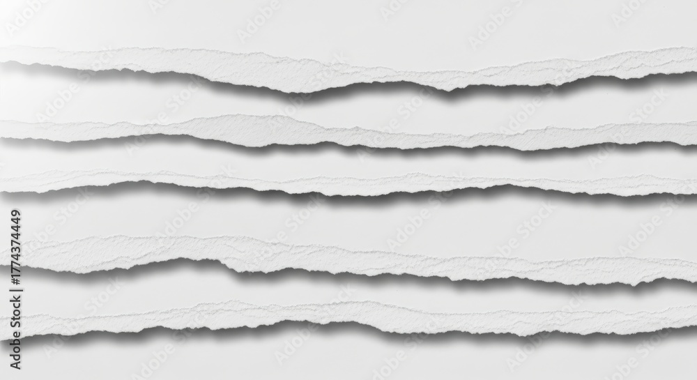 Fototapeta premium Torn paper edges with shadows, creating a textured and layered effect.