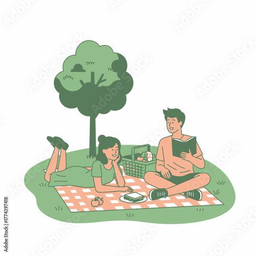 Couple enjoying a peaceful picnic under a tree reading and relaxing.
