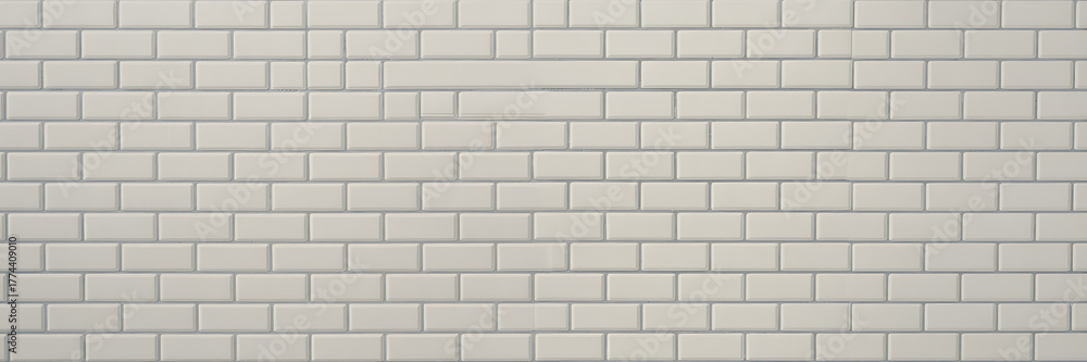 Naklejka premium A seamless pattern of light gray subway tiles with visible grout lines, creating a clean and modern texture