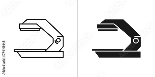 Outline and solid black icon of a stapler