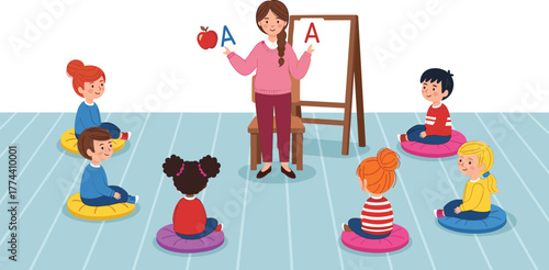 Teacher showing letter A to children in classroom during alphabet lesson with apple flashcard and whiteboard in early education
