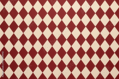 Seamless beige and burgundy harlequin diamond pattern background