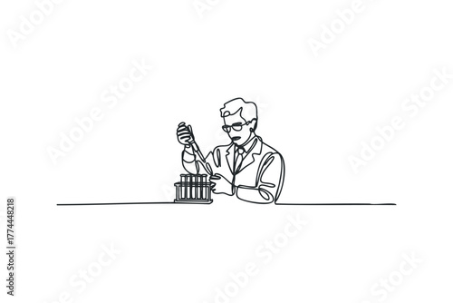 Scientist performs liquid transfer experiment using pipette and test tubes