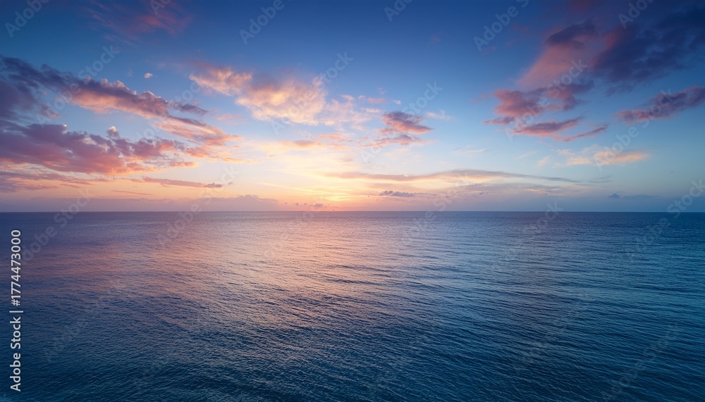 Obraz premium Serene Ocean Sunset With Soft Pastel Hues