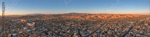 Aerial View of Barstow, California at Sunset: Panorama of Urban Landscape and Architecture Silhouette in San Bernardino County