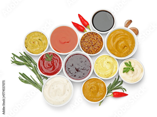 Wallpaper Mural Different sauces and herbs isolated on white, top view Torontodigital.ca