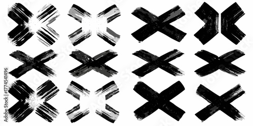 Collection of twelve diverse black and white brush stroke cross marks and xs