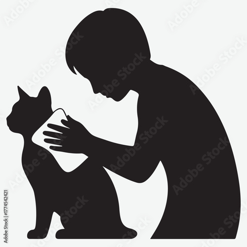 Silhouette of a person grooming a cat with a cloth
