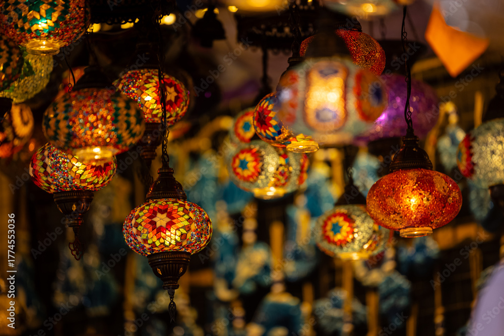 Fototapeta premium Turkey. Market with many traditional colorful handmade turkish lamps and lanterns. Lanterns hanging in shop for sale. Popular souvenirs from turkey.