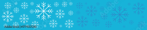 New Year snowflakes on a blue background, falling snow, Christmas and holiday