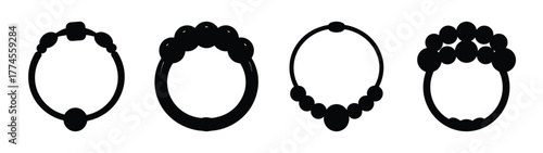 Collection of four diverse baby teething rings for soothing gums comfort