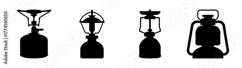 Collection of four distinct camping stove and lantern silhouettes for outdoor cooking and illumination