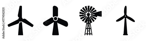 Collection of four diverse wind turbines including modern and traditional designs generating clean energy