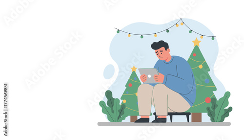 Sad man using tablet near Christmas tree Holiday blues loneliness or isolation concept