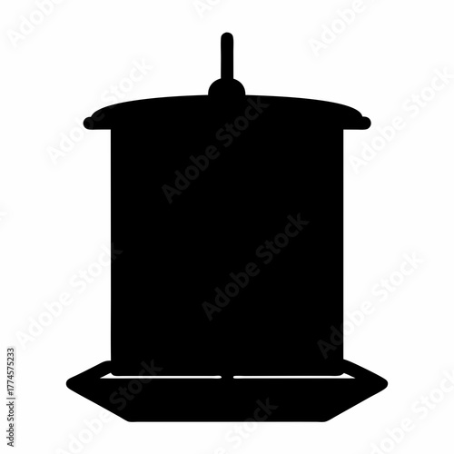 Silhouette of a rustic bird feeder with a platform and roof