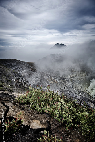 Kawah Ijen under a heavy, milky sky