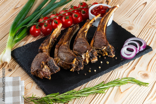 Grilled lamb shashlik on a wooden table