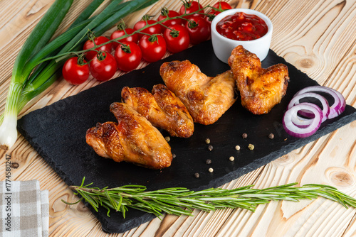 Grilled chicken shashlik on a wooden table