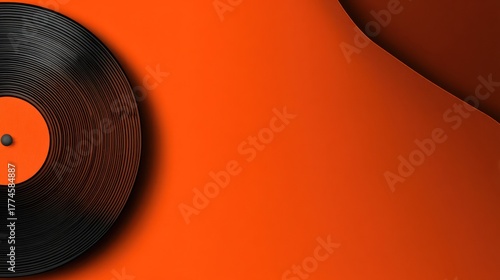 Vinyl record on vibrant orange background with copy space for artistic design