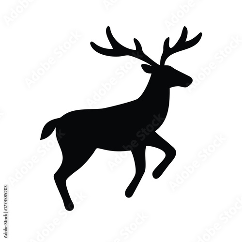 Silhouette of a majestic stag with impressive antlers in a dynamic pose