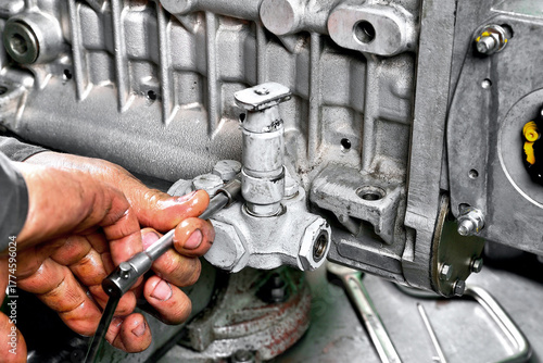 Photos repair of fuel pump of eight-cylinder diesel engine installation of equipment an