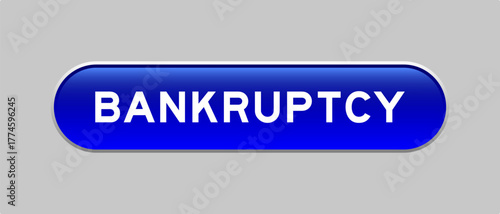 Blue color capsule shape button with word bankruptcy on gray background