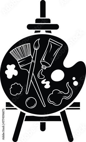 Black and white artists easel with palette paint