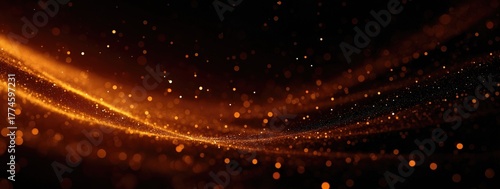 A black background with orange sparkles