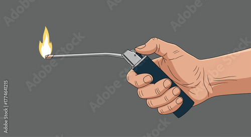 A hand holds and ignites a long-stemmed utility lighter, producing a bright yellow flame from its nozzle.