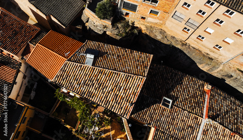 Aerial view of old  houses with terracota rooftops, traditional european village.