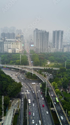 day time wuhan cityscape traffic street road aerial lakeside vertical panorama 4k timelapse china
