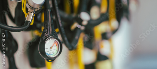 A diving equipment with regulators and tools for checking barrels.