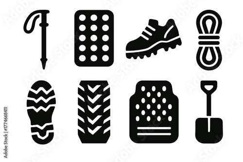 Outdoor Gear Icons. Outdoor traction tools silhouette set: hiking pole, traction pad, climbing shoe, rope, boot sole, tire tread, car mat, snow shovel.