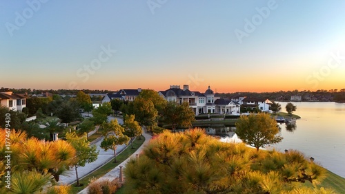 Aerial view of a peaceful  neighborhood with luxurious houses by Woodlands lake , Houston, Texas.