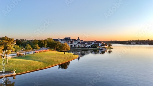 Aerial view of a peaceful  neighborhood with luxurious houses by Woodlands lake , Houston, Texas.
