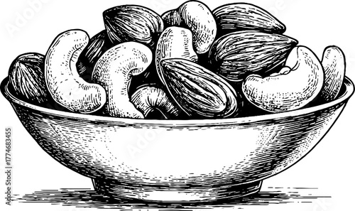Vintage engraving of almonds and cashews in bowl for culinary design and decoration